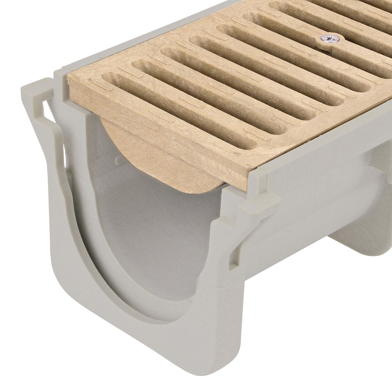 Closeup View of the sand plastic Dura Slope™ Channel Drain Grate (NDS 664) installed on the Dura Slope Channel Drain (NDS DS-091)