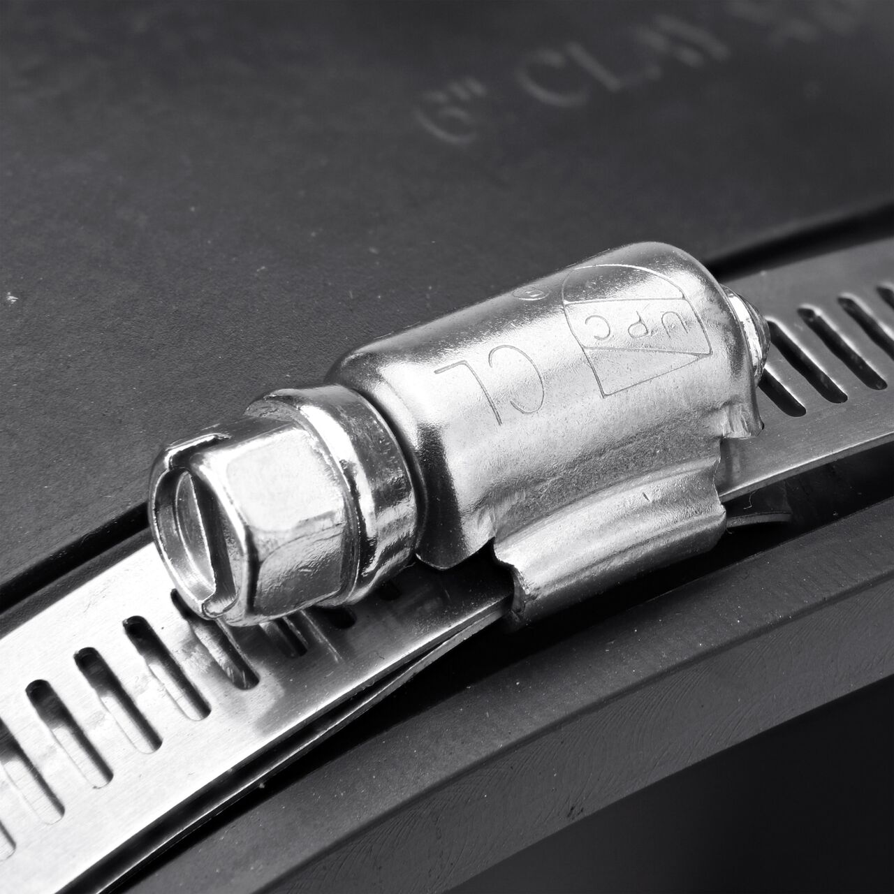 The clamps on the NDS 6 in. flex coupling for clay pipe to cast iron or plastic pipe can be tightened with screwdriver, 5/16 in. nut driver or socket to 60 inch-lbs. torque (NDS 02-66)
