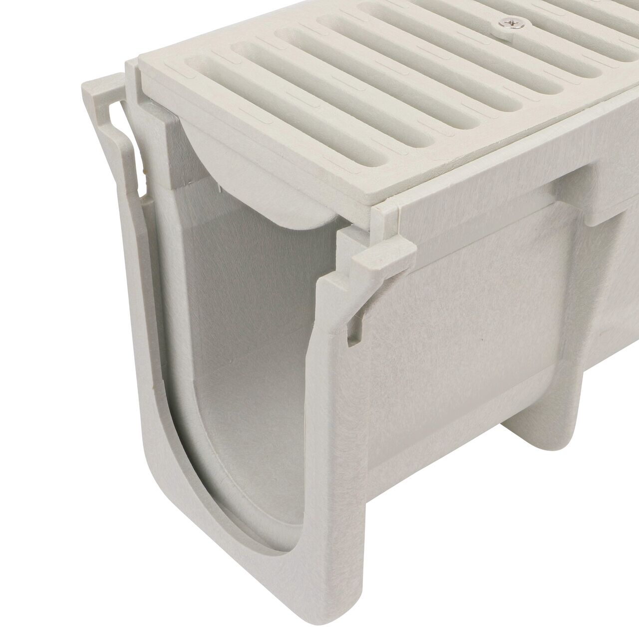 Closeup groove (female) side of the NDS 7.36 in. Deep Neutral Dura Slope Channel (NDS DS-101N) with the Standard Duraslope Light Gray Grate installed (NDS 661LG)