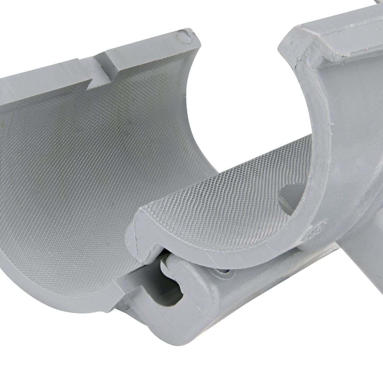 Closeup view of the hinge on the 2 in. NDS Flo-Tap™ Rigid PVC saddle with 3/4 in. socket or 1 in. spigot connection on top (NDS 3120) in the opened position that allows for easy installation onto Schedule 40 or Schedule 80 PVC pipe