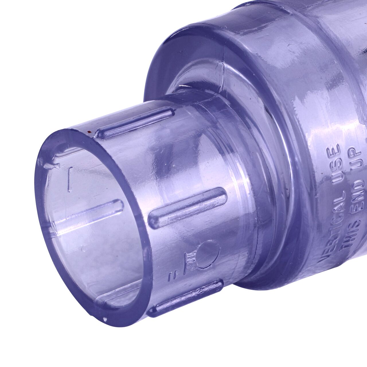 Closeup of the inlet end of the NDS Clear 1 in. slip end by slip end PVC Swing Check Valve (NDS 1520C10) which prevents backflow in pipelines
