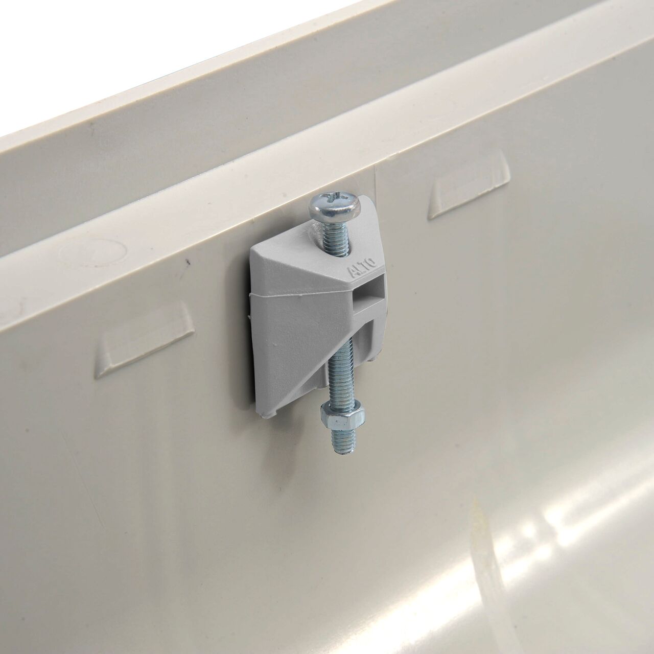 View inside shallow profile channel, showing where security clips (NDS 849) attach to the drain (NDS 840)