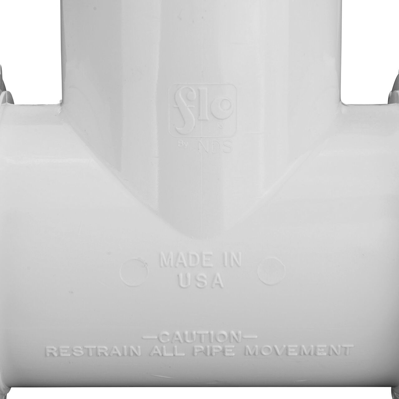 Closeup view of The NDS PVC Threaded Tees 2 in. IPS UC X FPT showing that it is made in the USA as part of a complete flow management system for pool, spa, irrigation, and plumbing applications (NDS CPT-2000-T)