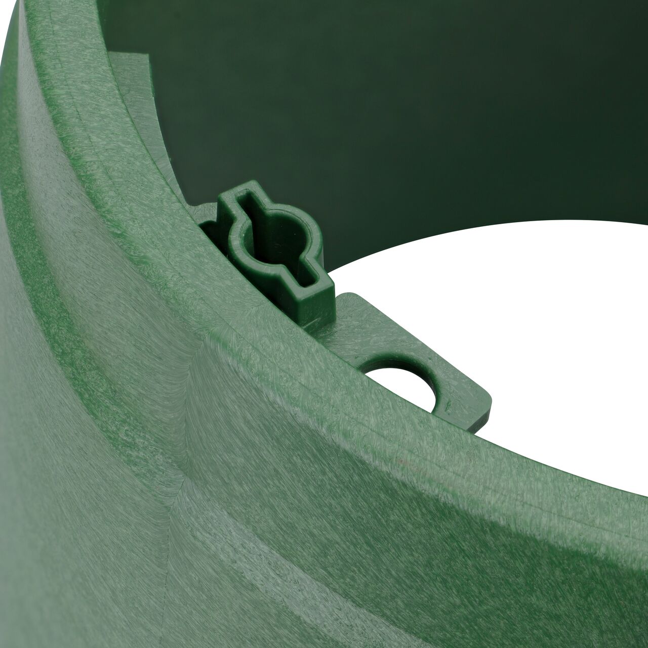 Closeup view on the bolt hole on the NDS green plastic 10 in. Round Standard Series Valve Box (NDS 112B)