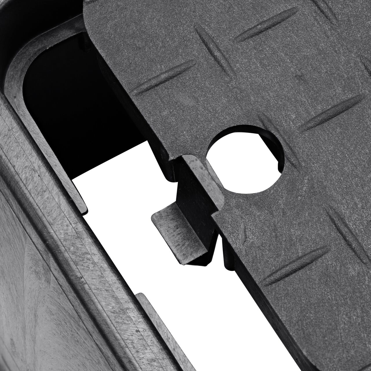 Closeup view of the hinged side of the plastic reader door on the NDS 10 in. X 15 in. Rectangular D1000 Series Meter Box & Water Meter Cover (NDS D1000-SB)
