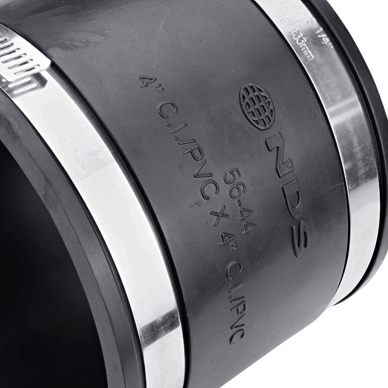 Closeup view of the NDS 4 in. flex coupling mark showing the size and compatible cast iron/sewer and drain or DWV/copper/steel/lead pipes eliminating guesswork on the job (NDS 56-44)