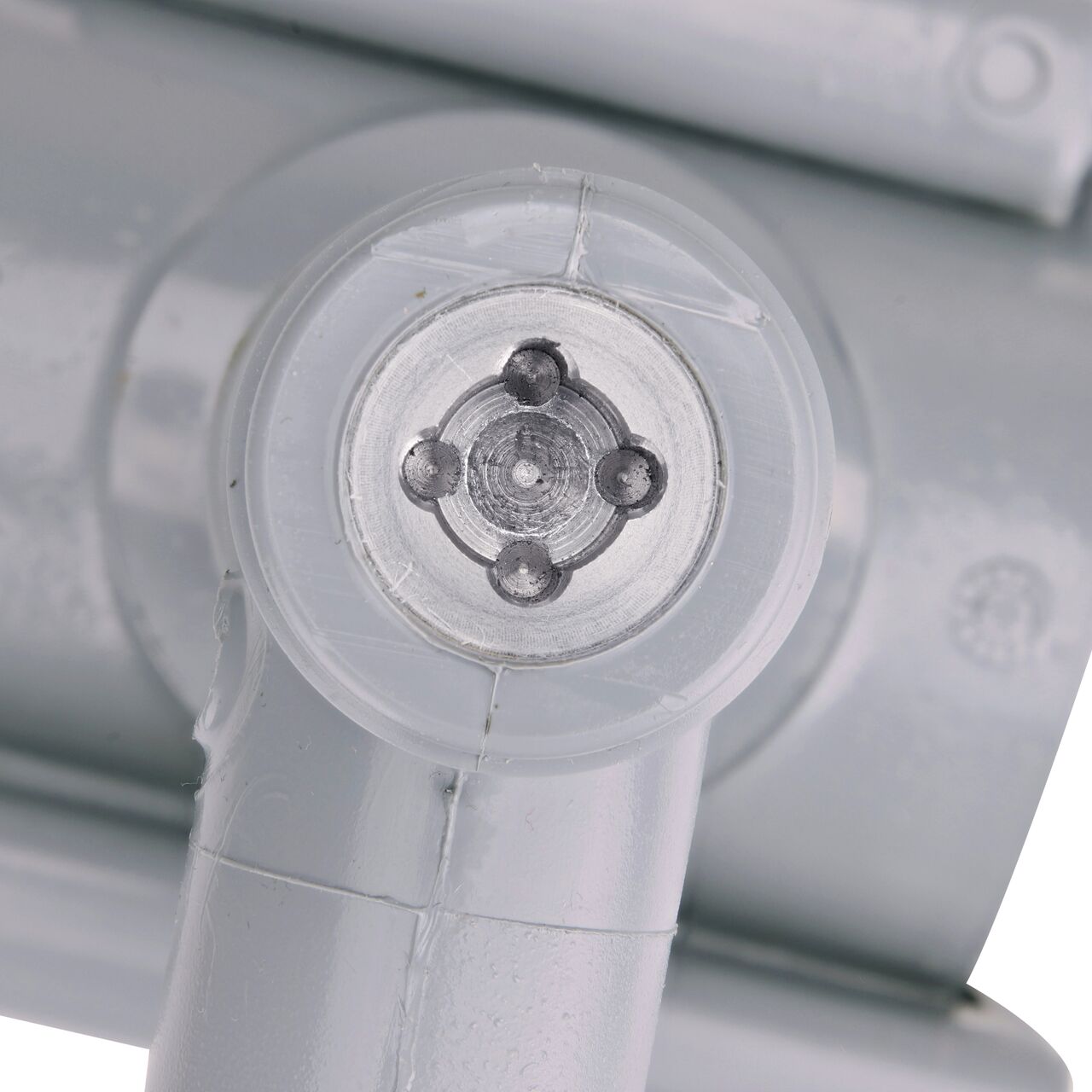 Closeup view of the built-in saw tooth cutter in the top connection of the 2 in. NDS Flo-Tap™ Rigid PVC saddle with 3/4 in. socket or 1 in. spigot which cuts easily through PVC pipe wall and captures debris before it can enter the water supply (NDS 3120)