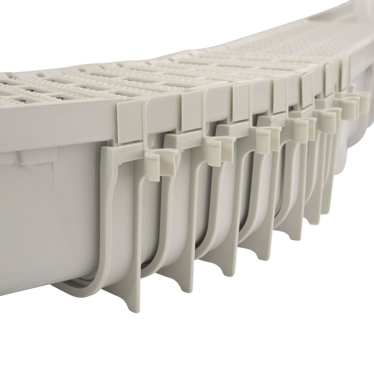 Close-up, side view of a series of 5 in. Pro Series Channel™ Drain Qwik-Turn™ Deep Profile Radius Couplings connected together, are then connected to 5 in. Pro Series Deep Profile Channel Drain (NDS 800, NDS PSRC-864)