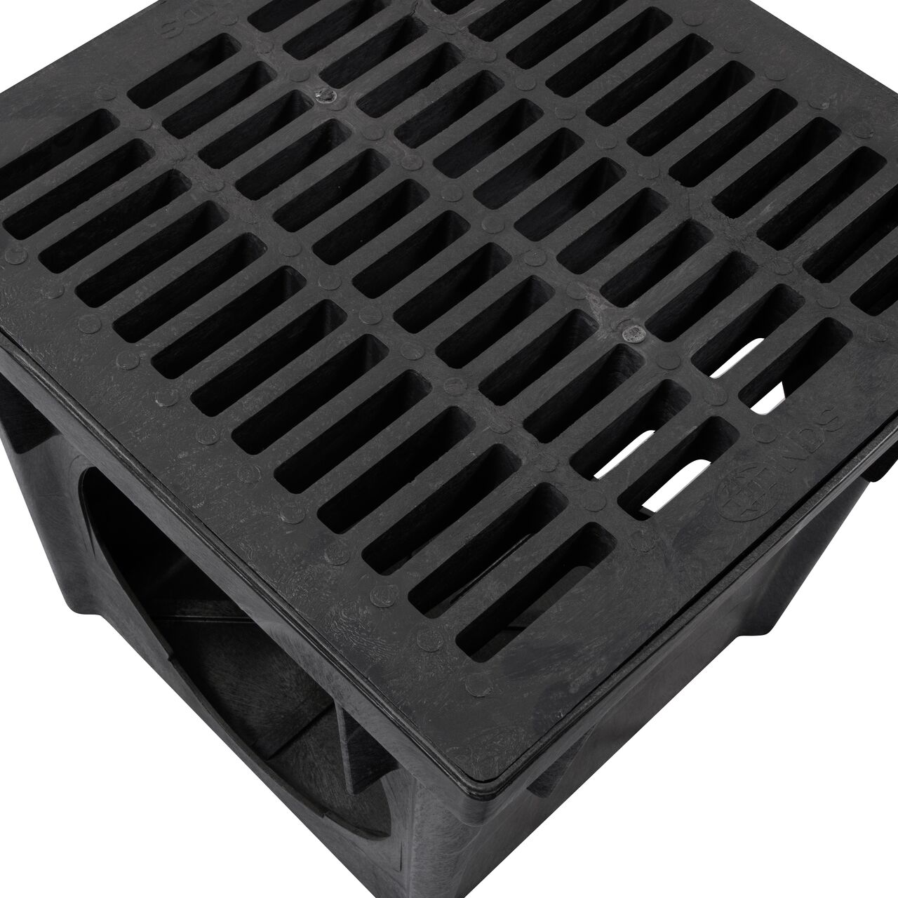 Closeup View of the NDS 24 in. Black Plastic Grate (NDS 2411) installed on a NDS 24 in. Catch Basin Drain (NDS 2400)