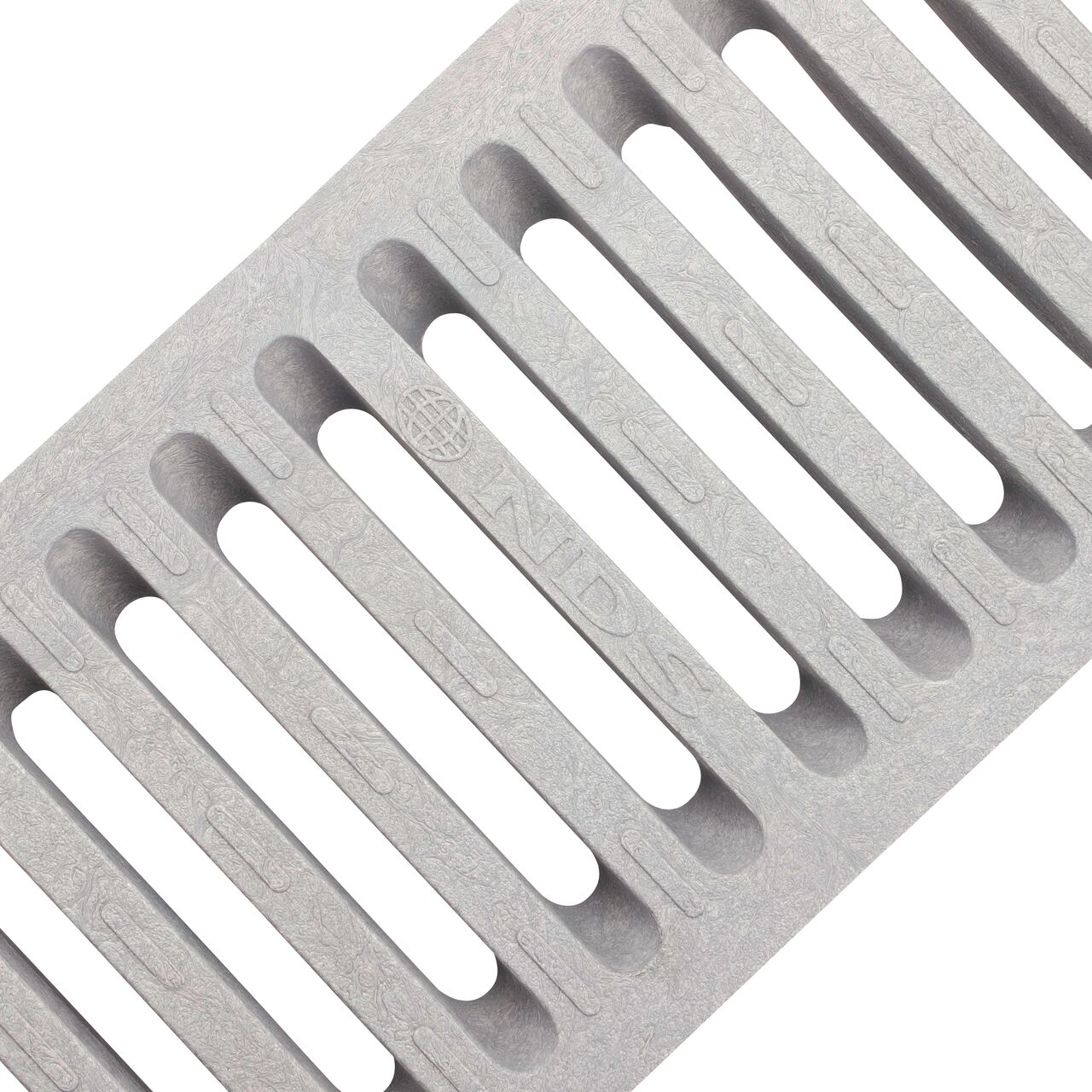 Angled View of the dark gray plastic Dura Slope™ Channel Drain Grate (NDS 661) perforated design