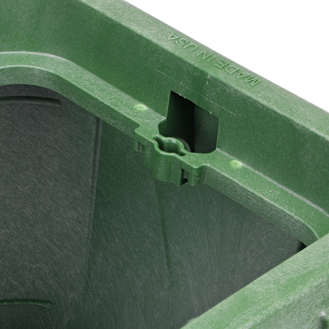 Closeup view of the universal locking mechanism hole on the Green NDS 14 in. X 19 in. Rectangular Pro-Spec® Series Valve Box (NDS 314B) for securing valve lid or cover to the valve box