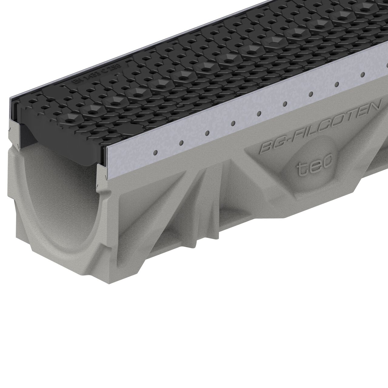 Closeup view of the class C COMBee design plastic BG-FILCOTEN® 100 Trench Drain Grate (NDS 17010402) installed on the BG-FILCOTEN® 100 Trench Channel Drain with female end showing