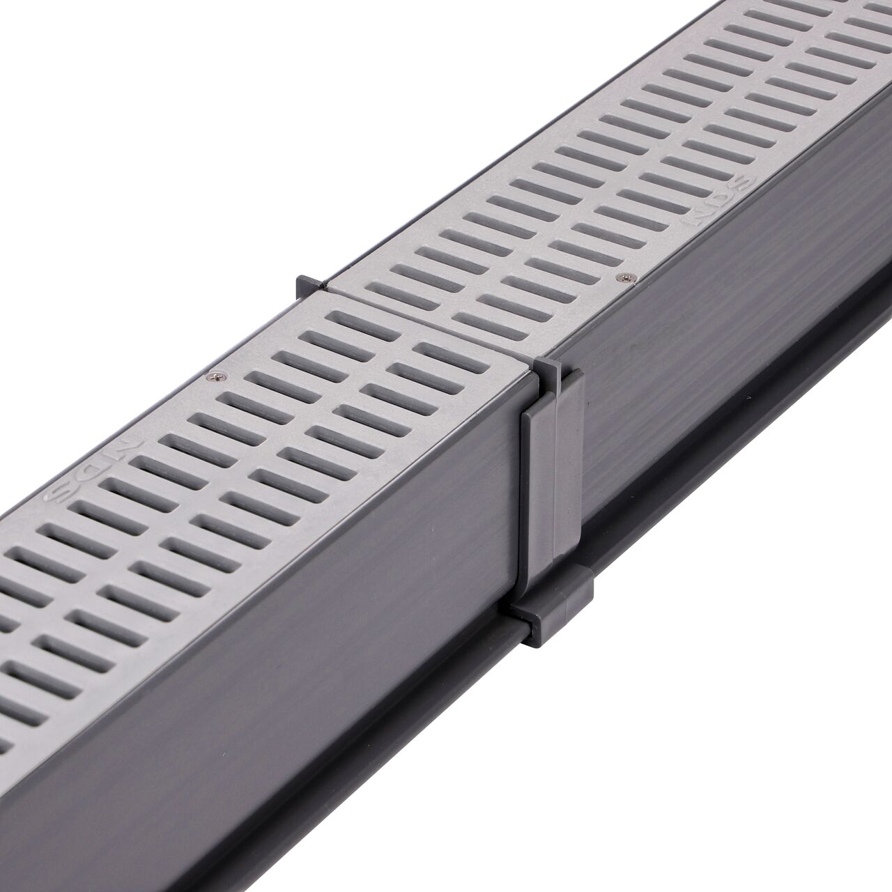 Step 3: Connect the second Mini Channel™ Drain (NDS 500) with gray grate (NDS 541) to the other side of the Mini Channel™ Drain Coupling (NDS 548) for a secure fit