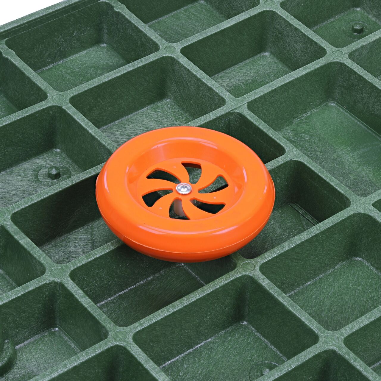 Closeup view of the 101.4 kHz frequency electronic marker disc installed on the telecom cover for the NDS 17 in. X 30 in. Rectangular Pro-Spec® Series Telecom Box (NDS 326BCBT-BG-M) makes locating boxes buried underground when using a marker locator