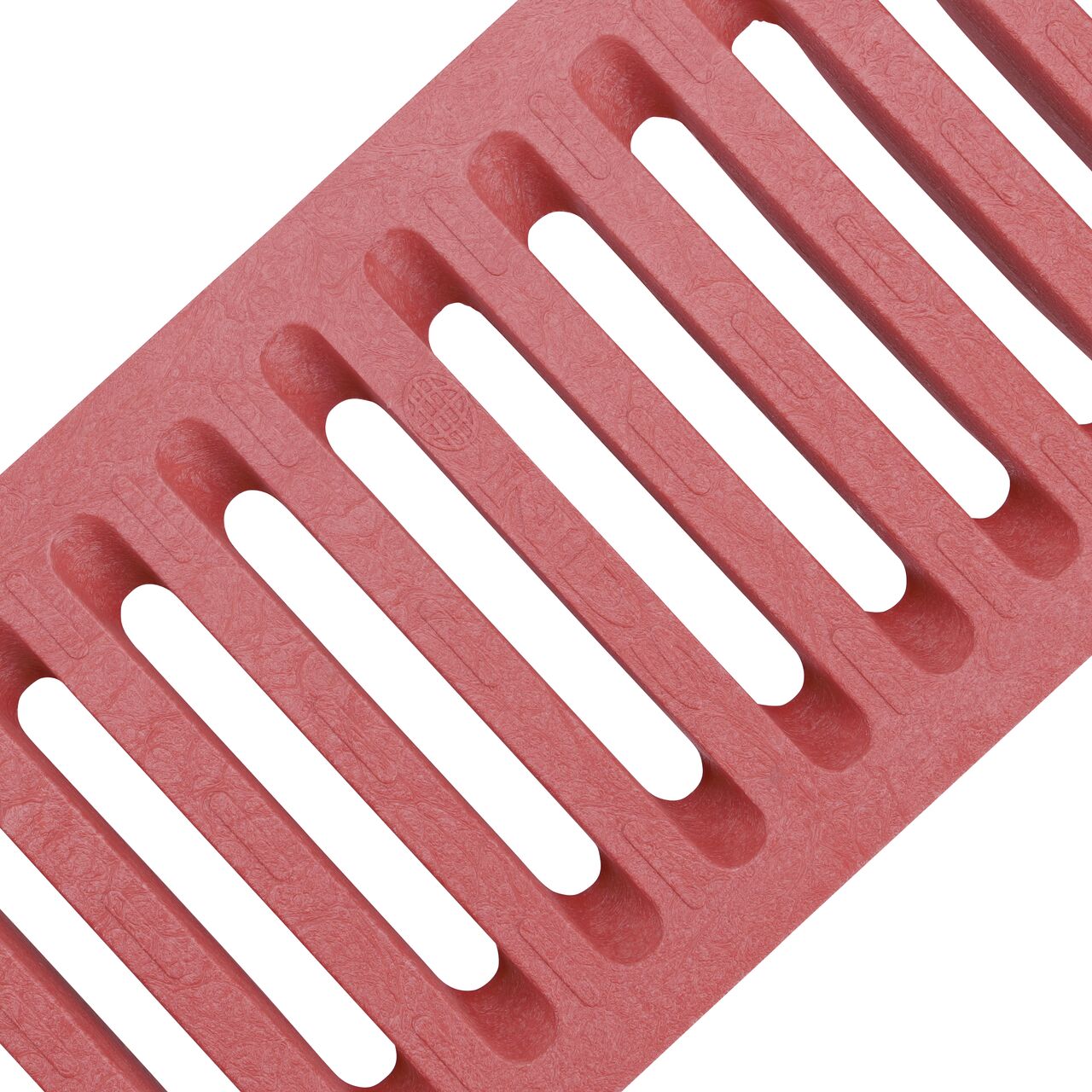 Angled View of the brick red plastic Dura Slope™ Channel Drain Grate (NDS 665) perforated design