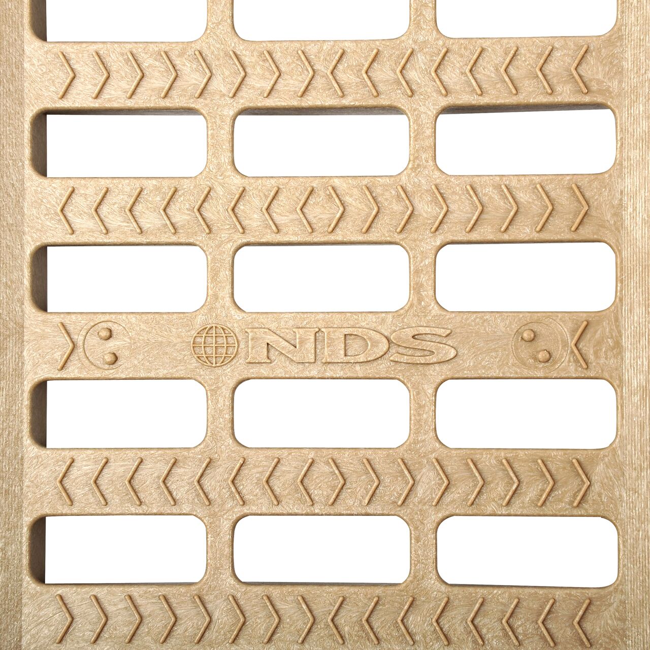 Top down partial closeup of grate openings on NDS 5 in. Pro Series Channel Drain Grate in Sand Plastic (NDS 817)