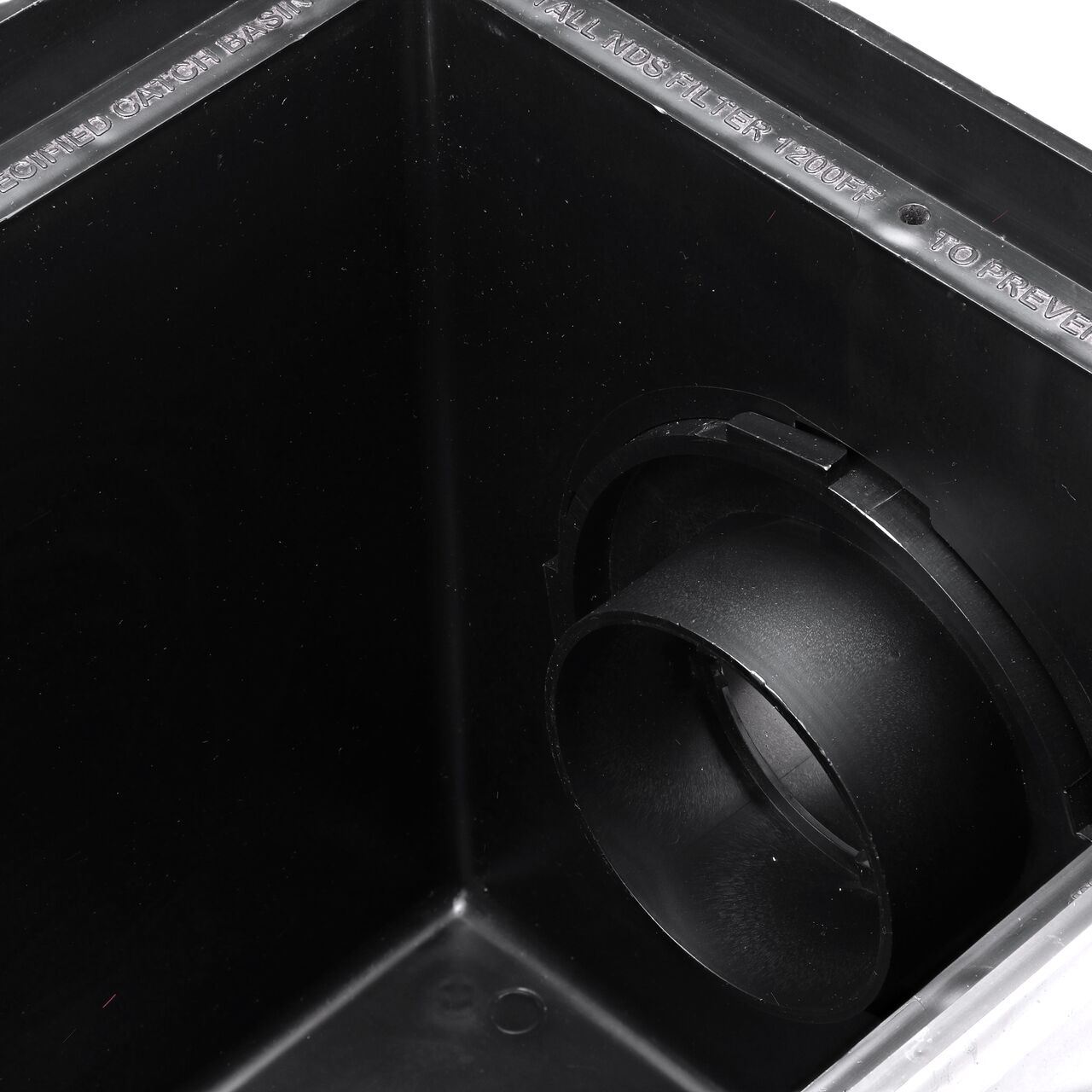 The inside view of the NDS Outlet Adapter with Internal Spigot for adjustable invert height (NDS 1242) installed on a 12 in. Catch Basin Drain (NDS 1200)