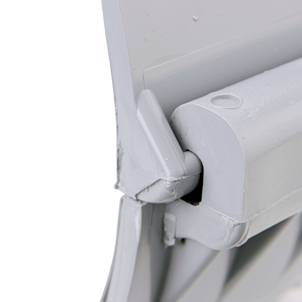 Closeup of the hinge closed on the NDS Clamp-It™ Rigid PVC Saddle with 2 in. FPT connection on top (NDS 448020) for 8 in. PVC pipe