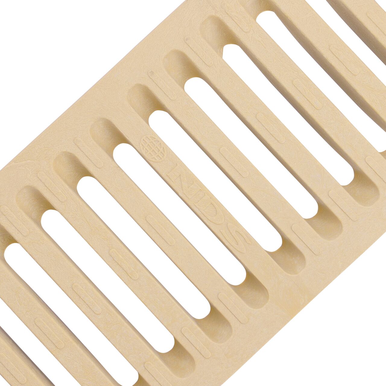 Angled View of the sand plastic Dura Slope™ Channel Drain Grate (NDS 664) perforated design