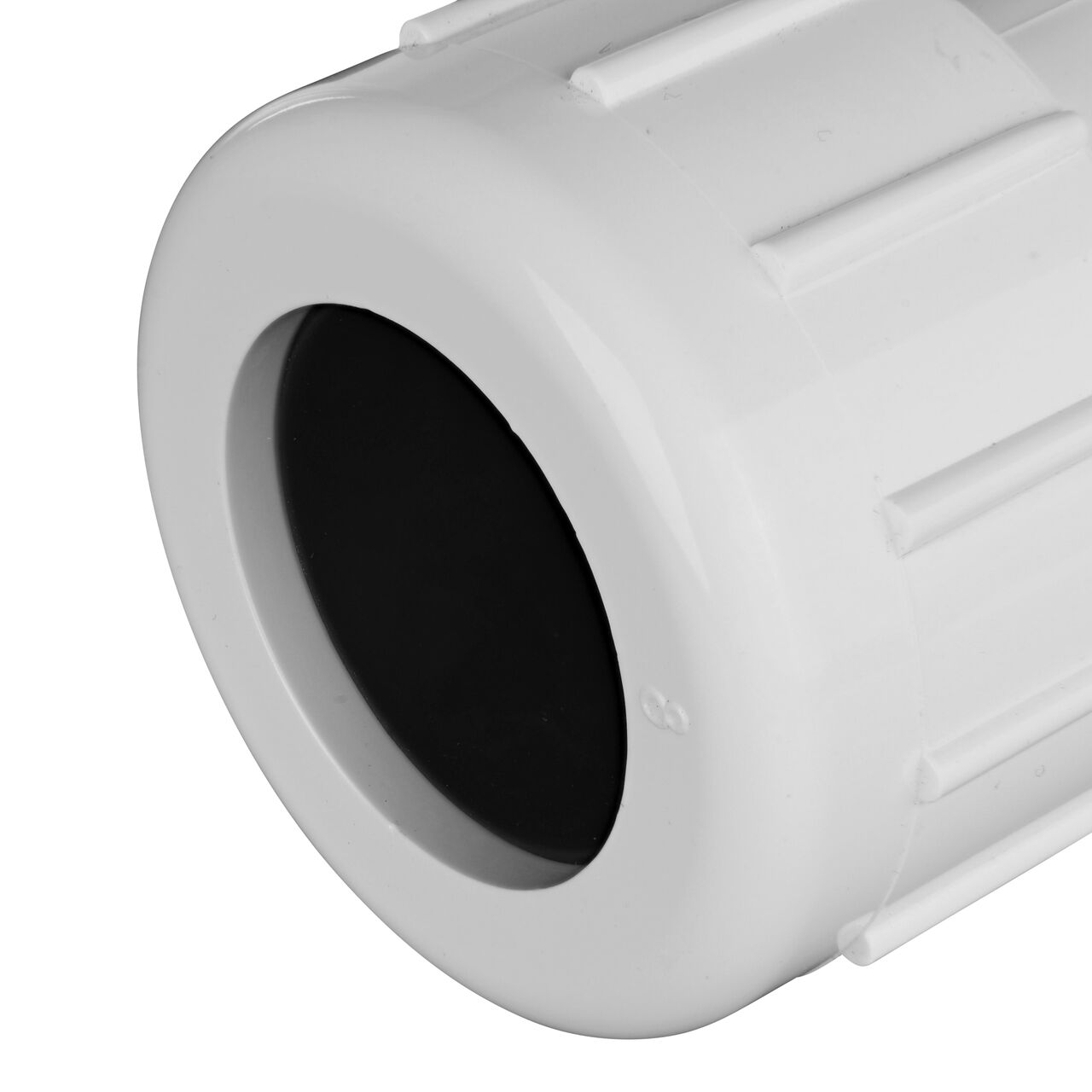 Closeup view of the NDS IPS UC Compression Coupling showing the 1 in. compression end with adjustable nut secured which reduces pull-out from pipe (NDS CPC-1000)