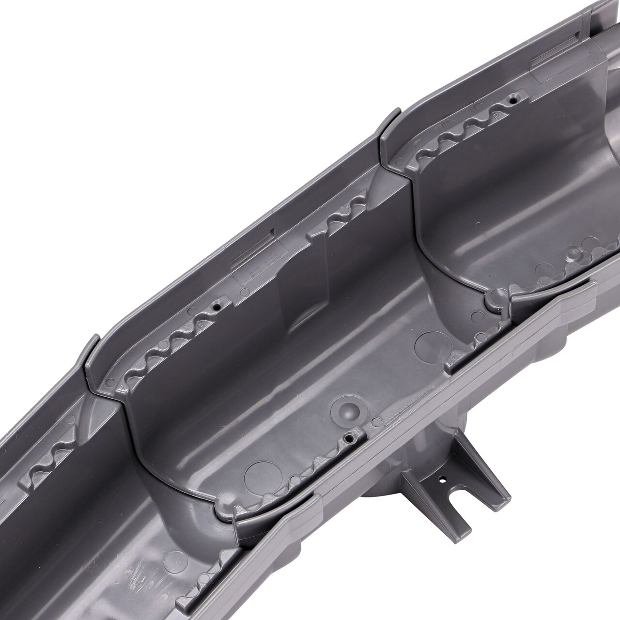 View of the NDS Spee-D® Contour™ Channel Drain Start, End, and Middle Section all connected without the grates to see how the curve allows water to flow freely through the channel drain system