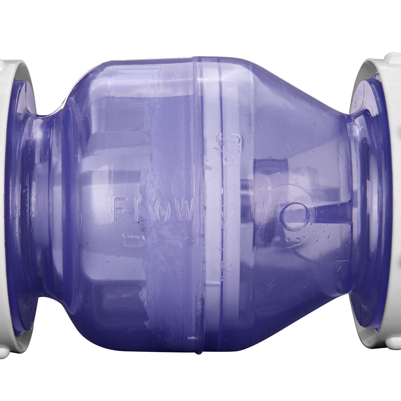 Closeup of the arrow showing water flow direction on the NDS Clear 1-1/2 in. slip end by slip end with 1/2 lb. spring PVC True Union Spring Check Valve (NDS 1700C15)