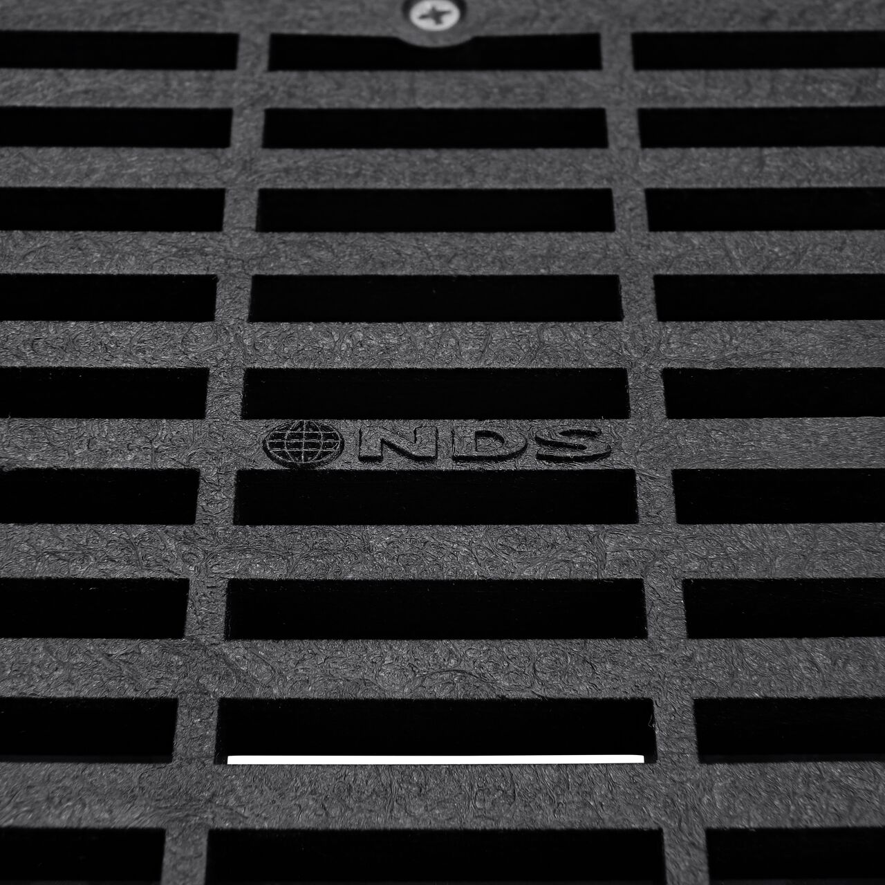 Closeup of the Grate Design on the NDS 6 in. Square Grate with Low-Profile Adapter, Black Plastic (NDS 640*, NDS 640)