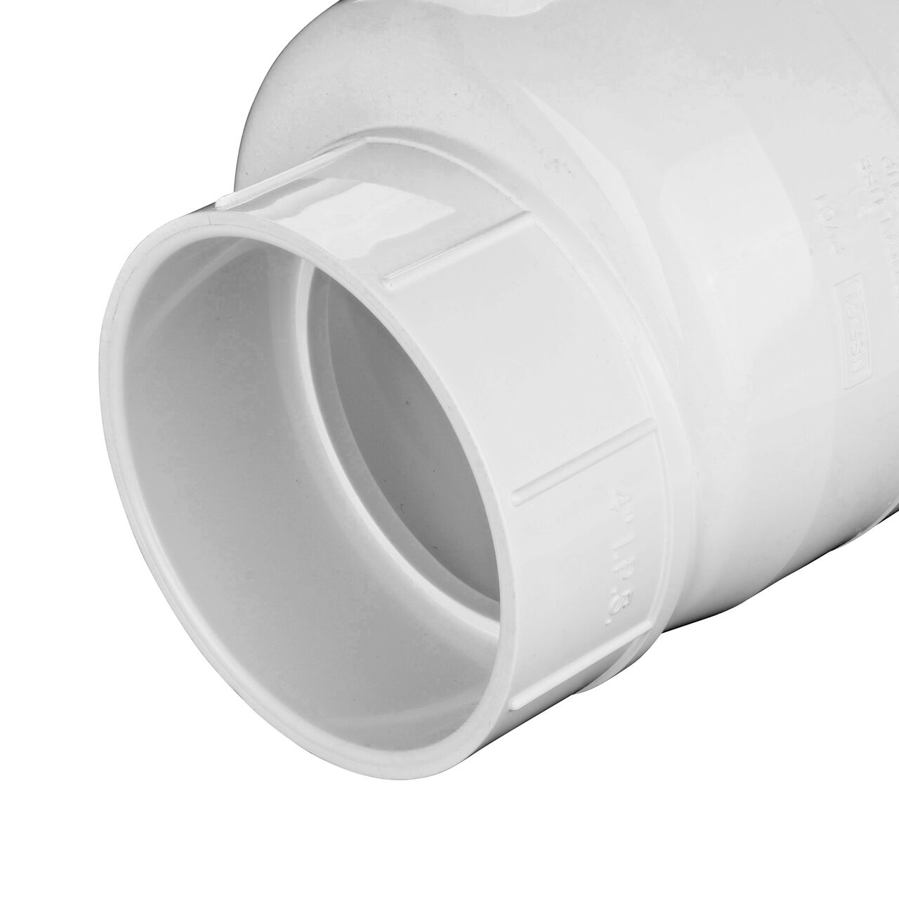 Closeup of outlet end on the NDS White 4 in. slip end by slip end PVC Swing Check Valve (NDS 1520-40) which prevents backflow in pipelines