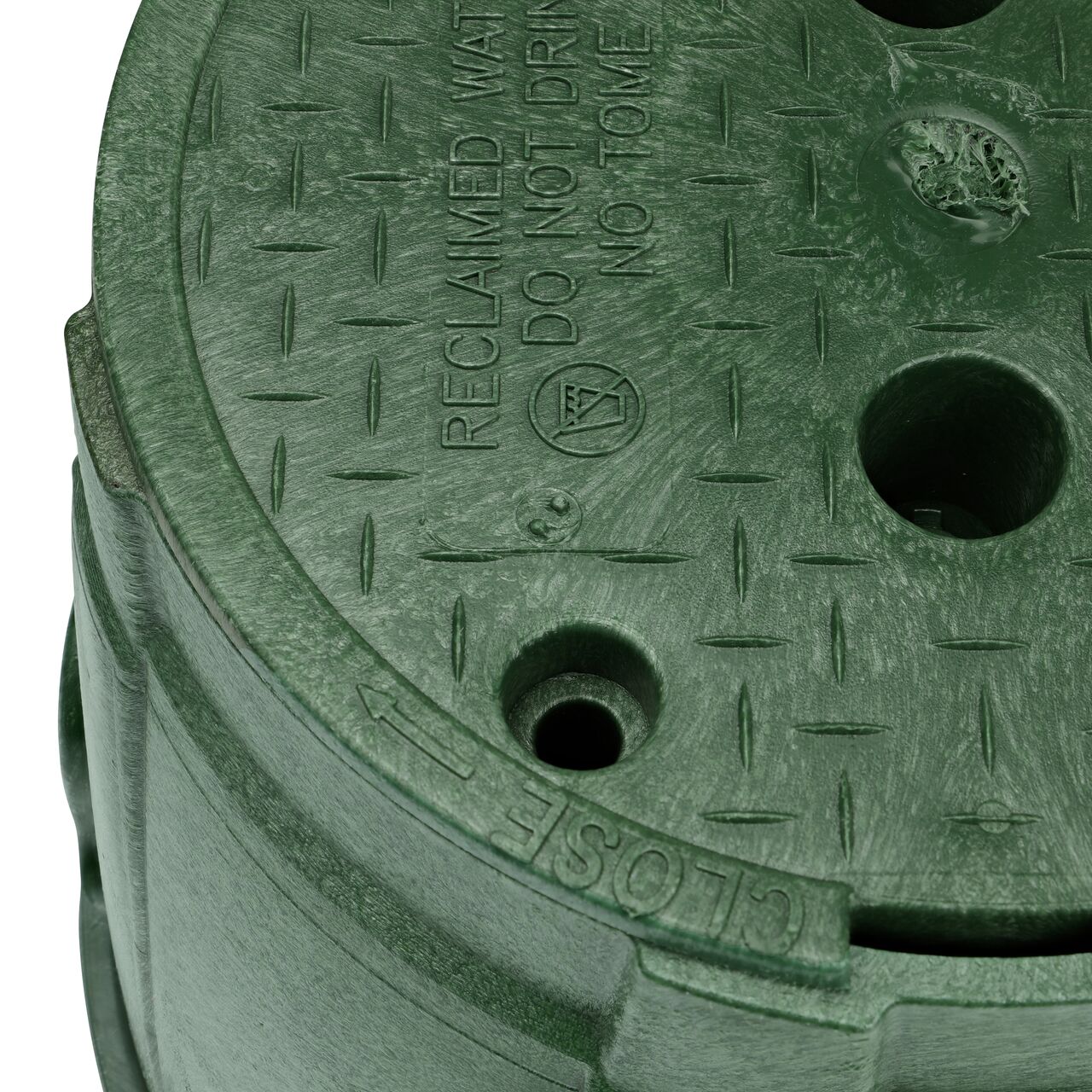 The valve box lid securely in place on the NDS 10 in. Round Pro-Spec® Series Green Box and Green Reclaimed Water Cover (NDS 312BCRG) keeping components protected against the elements, foot traffic, lawn care equipment, and potential vandalism while keeping them out of sight