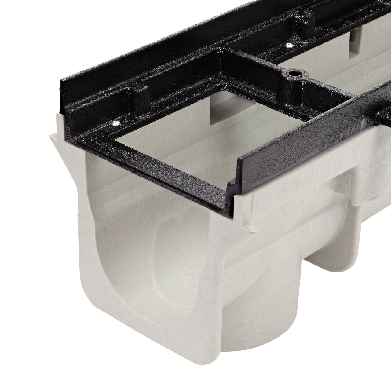Closeup of the Dura Slope™ Channel Drain Frame (NDS DS-200H) installed on the NDS Dura Slope Channel Drain (NDS DS-091) and the #6 X 3/4 in. Phillips Pan Head Screw (NDS DS-123); male end facing camera