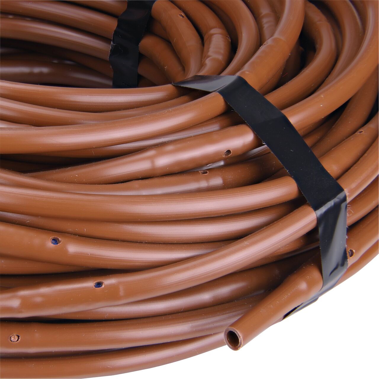 Closeup of the end to show how to pull out the dripline without the label of the NDS 100 ft. 1/4 in. Dura Flo™ JR Dripline with 6 in. spaced 0.5 GPH Non-Pressure Compensating Emitters (NDS SFJR-BR-06-01)