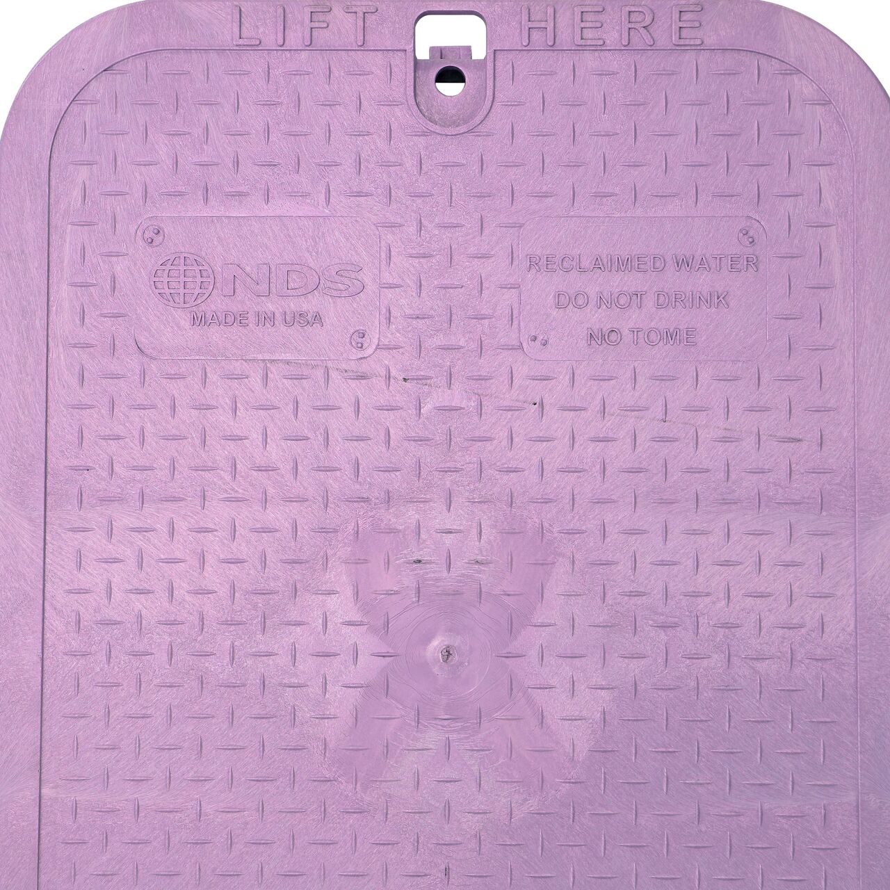 Closeup view of the Reclaimed Water markings on the Purple Reclaimed Water cover for the NDS 13 in. X 20 in. Rectangular Standard Series Jumbo Valve Box (NDS 117PBCR)