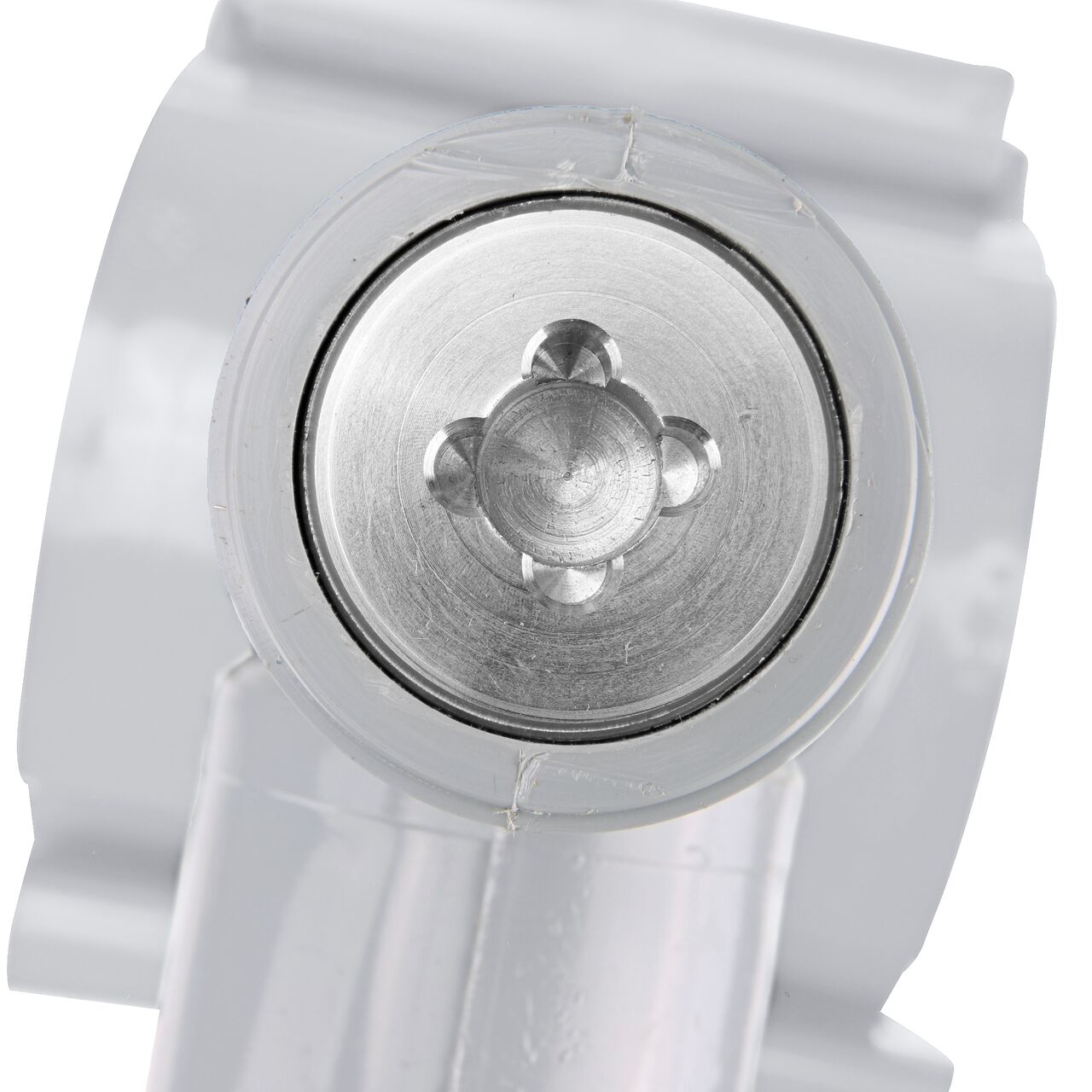 Closeup view of the built-in saw tooth cutter in the top connection of the 4 in. NDS Flo-Tap™ Rigid PVC saddle with 1-1/2 in. socket or 2 in. spigot which cuts easily through PVC pipe wall and captures debris before it can enter the water supply (NDS 3240)