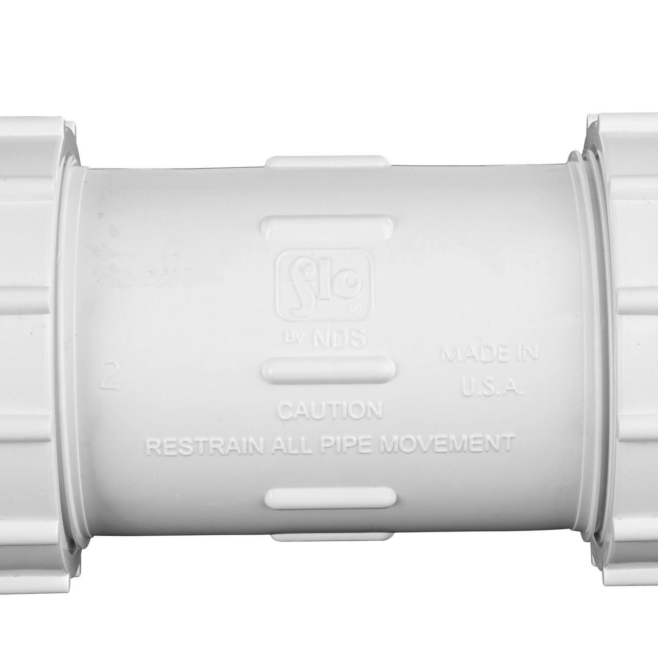 Closeup view of the NDS 2 in. IPS UC Compression Coupling showing that it is made in the USA as part of a complete flow management system for pool, spa, irrigation, and plumbing applications (NDS CCC-0500)