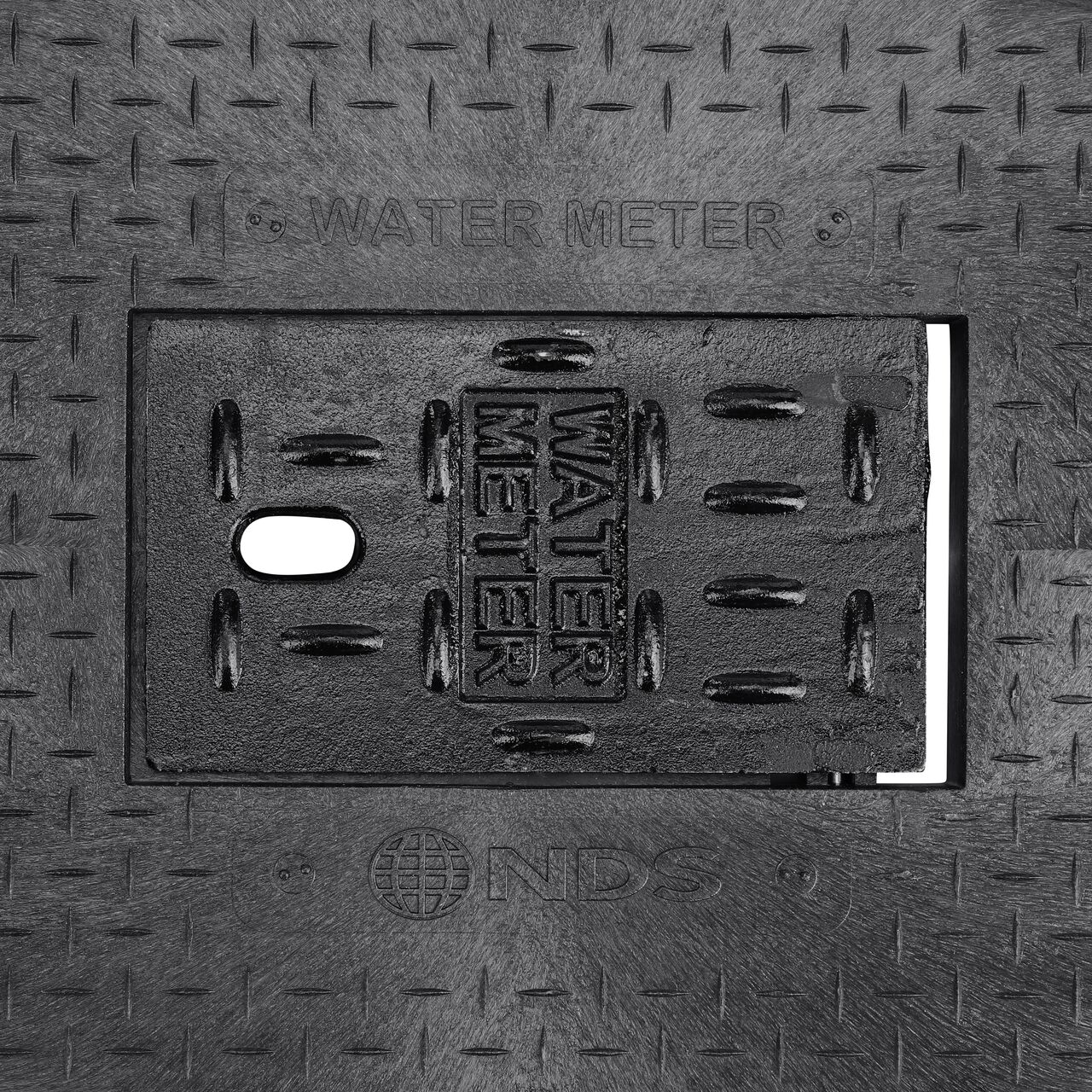 Closeup view of the Water Meter markings and Cast Iron reader door on the Black Water Meter Drop-in cover for the NDS 14 in. X 19 in. Rectangular Standard Series Meter Cover (NDS D1200-DICIRLID)