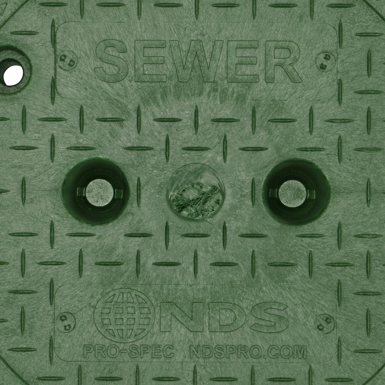 Closeup view of the Sewer Water markings on the green sewer water valve cover (NDS 311CS) for the NDS 10 in. Round Pro-Spec® Series Valve Box