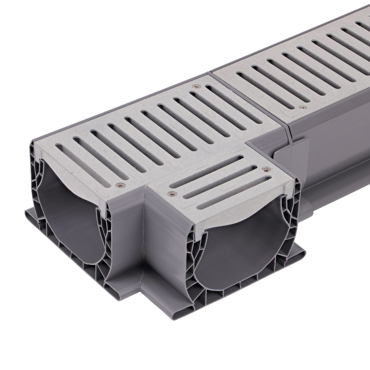 Connect the main channel length on the Spee-D® Channel Drain and Grate with Tee (NDS 2371) to the longer Spee-D® Channel Drain (NDS 400, NDS 400-10, NDS 400-10WH) with the Spee-D® Channel Drain Coupling