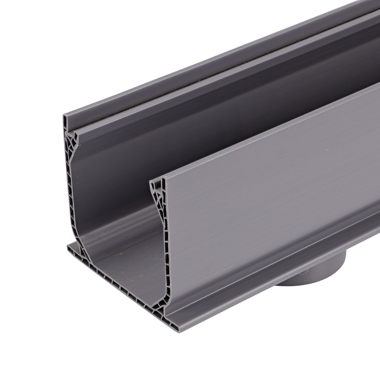 Closeup of the outlet end of the Mini Chanel Drain Bottom Outlet (NDS 550) with the focus on the channel drain profile