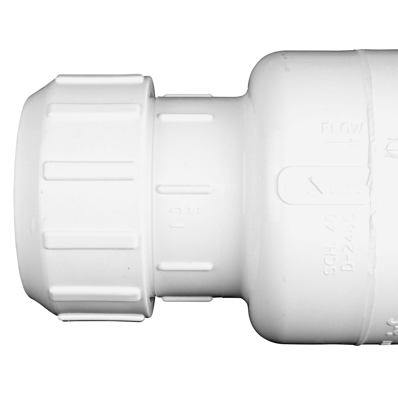 Closeup of the arrow showing water flow on the NDS White 2 in. PVC Compression Swing Check Valve (NDS 1500-20)