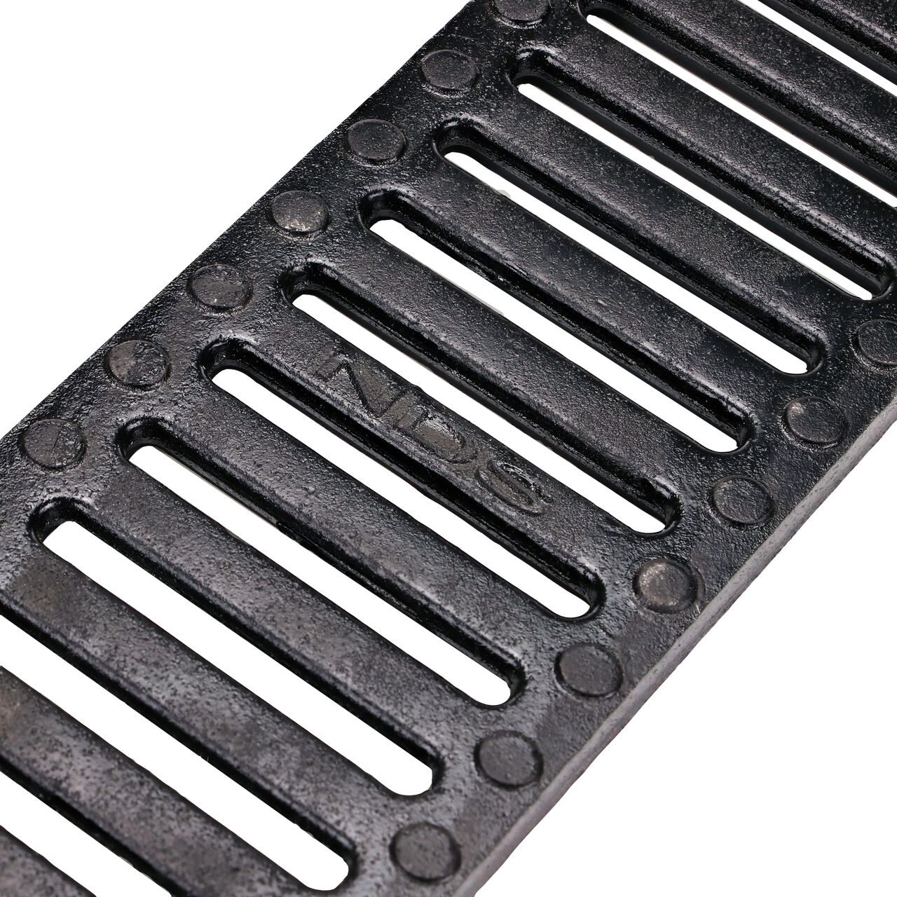 Angled view of the NDS Ductile Iron 5 in. Pro Series Channel™ Drain Grate (NDS 823)