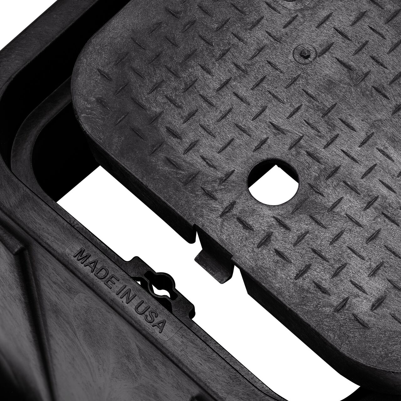 Align the bolt hole on the lid with the universal locking mechanism hole from the NDS 14 in. X 19 in. Rectangular Standard Series Black Meter Box and Black Sewer Cover (NDS D1200-DISBSWR) for a secure fit