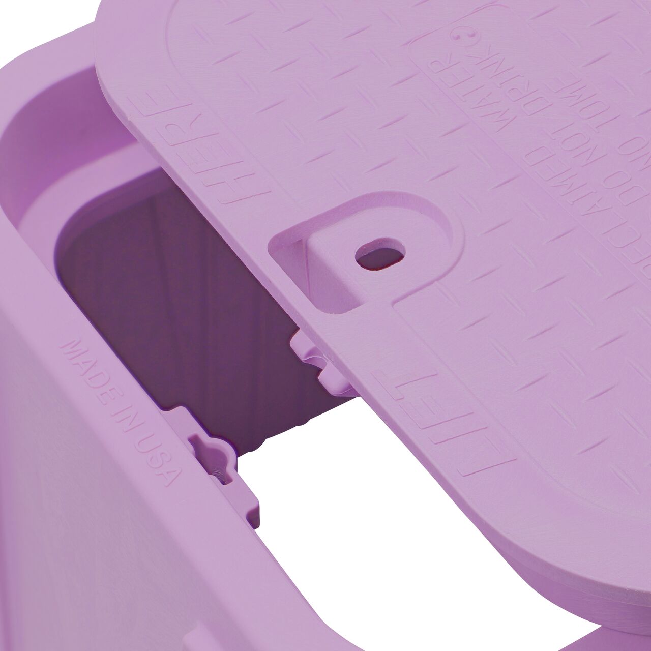 Align the bolt hole on the lid with the bolt hole from the NDS 14 in. x 19 in. Rectangular Pro-Spec® Series Purple Box and Purple Reclaimed Water Cover (NDS 314PBCBR) for a secure fit