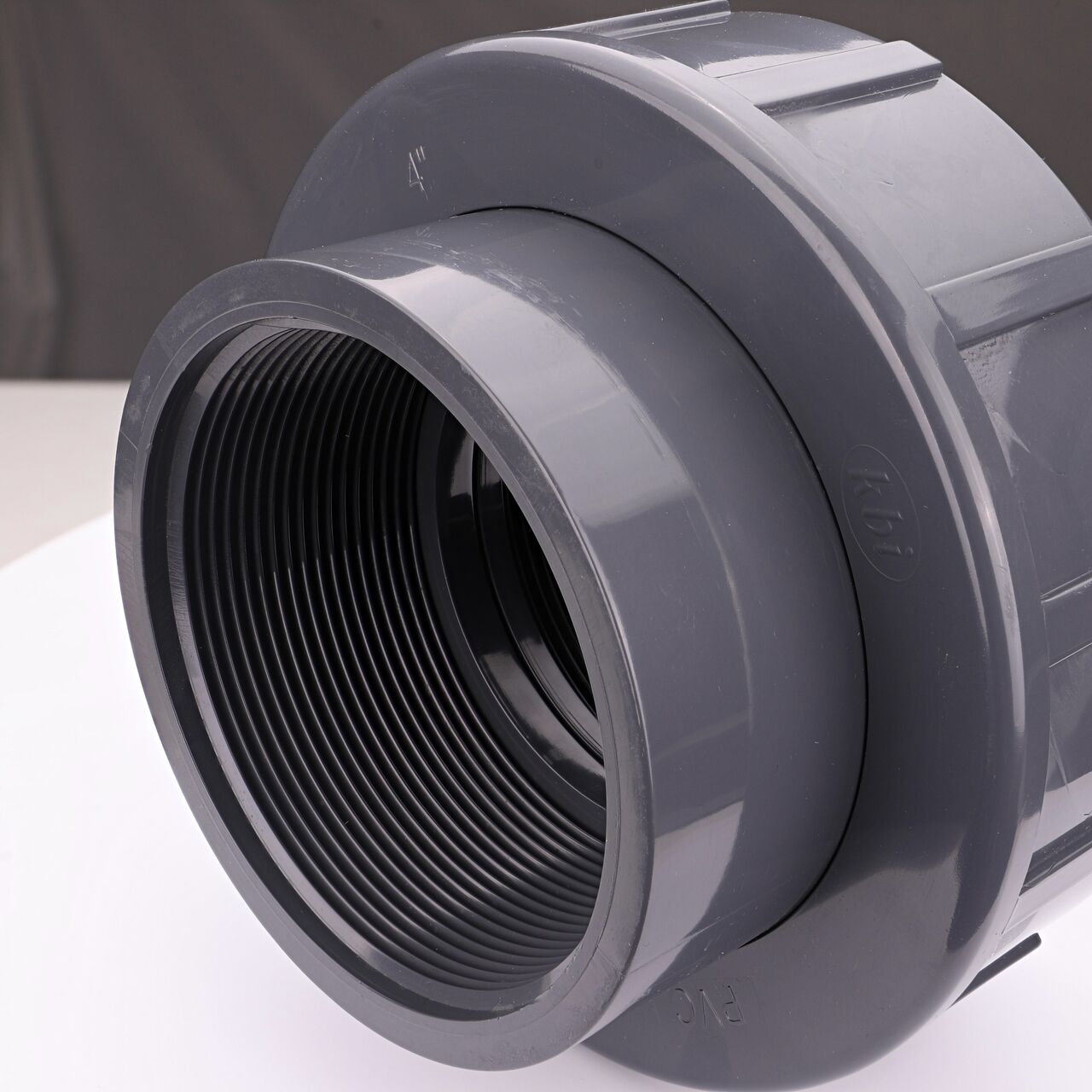 Closeup view of the other threaded end on the NDS 4 in. PVC Union (NDS U-4000-T) used to connect pipes and provide a quick way to separate pipes when needed