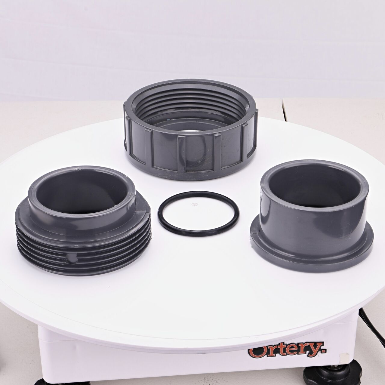 The NDS 2-1/2 in. PVC Union shown here unassembled, includes the EPDM O-ring that is placed in the center of the union to create a leak-resistant seal (NDS U-2500-S)