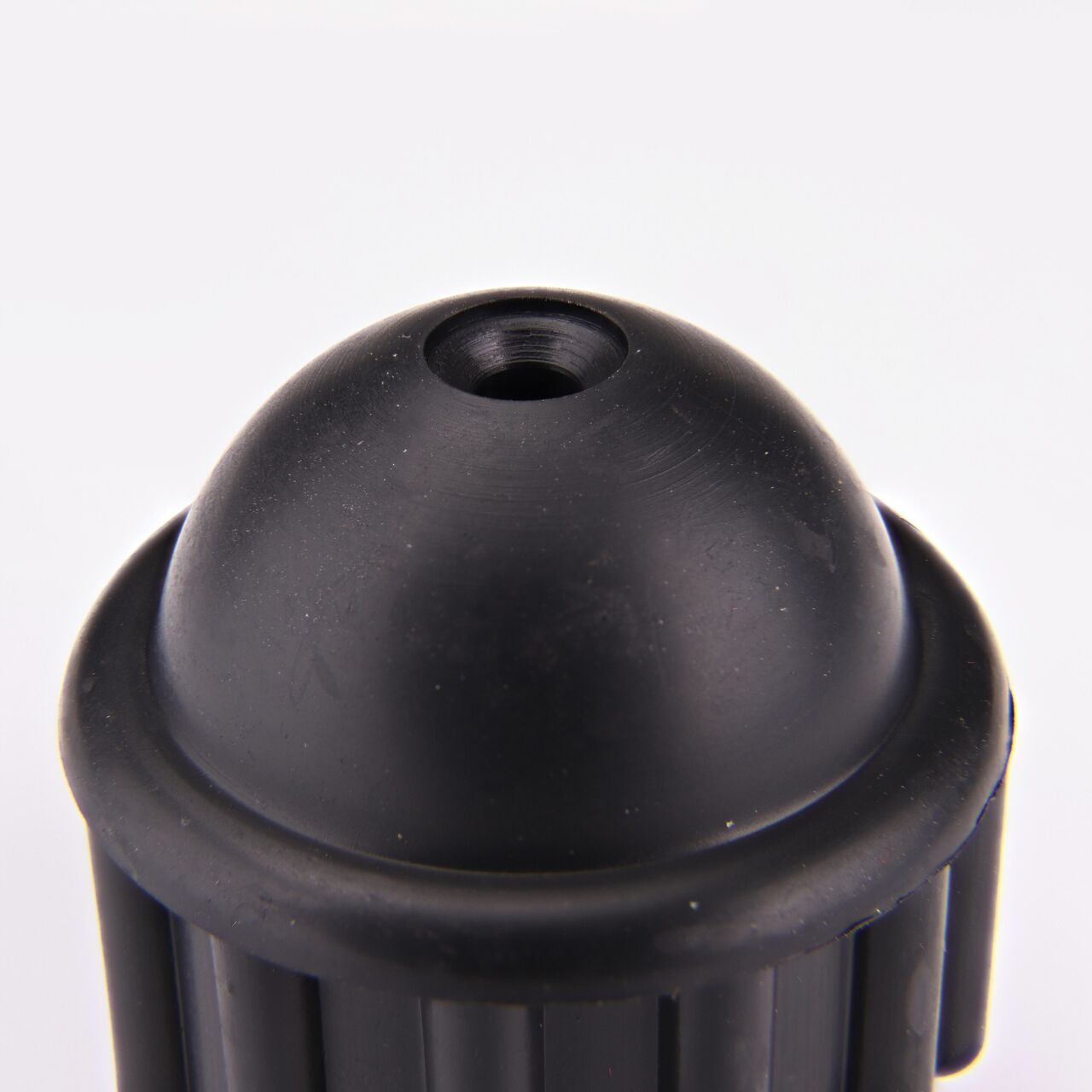 Closeup View of the domed 1/4 in. emitter port of the NDS Micro Adapter Emitter Socket (NDS REA)