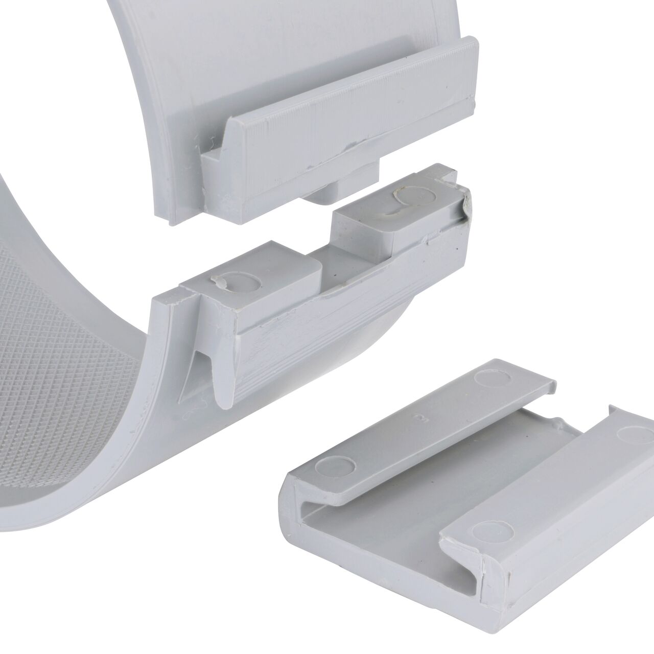 Closeup of the wedge latch uninstalled on the NDS Clamp-It™ Rigid PVC Saddle for 4 in. PE pipe with 3/4 in. FPT connection on top (NDS 344007P)