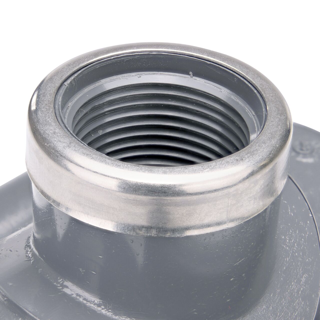 Closeup of the 1 in. FPT connection on the NDS Clamp-It™ Rigid PVC Saddle (NDS 422010) for 2 in. PVC pipe