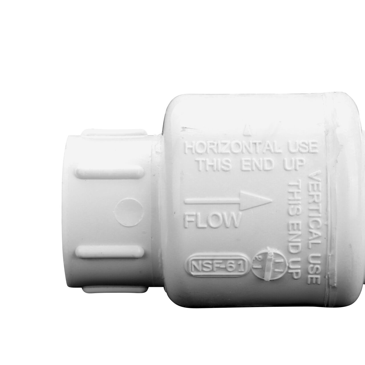 Closeup of the arrow showing water flow of the NDS White 3/4 in. female end by female end PVC Swing Check Valve (NDS 1520-07F)