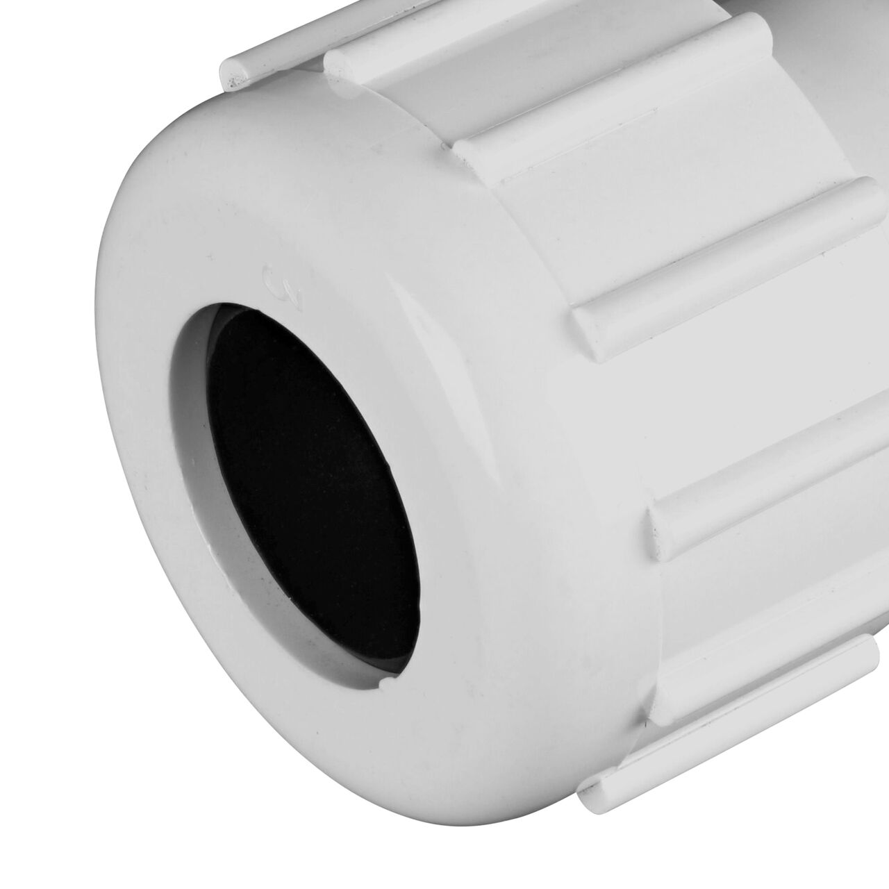 Closeup view of the NDS CTS UC Compression Coupling showing the 3/4 in. compression end with adjustable nut secured which reduces pull-out from pipe (NDS CCC-0750)