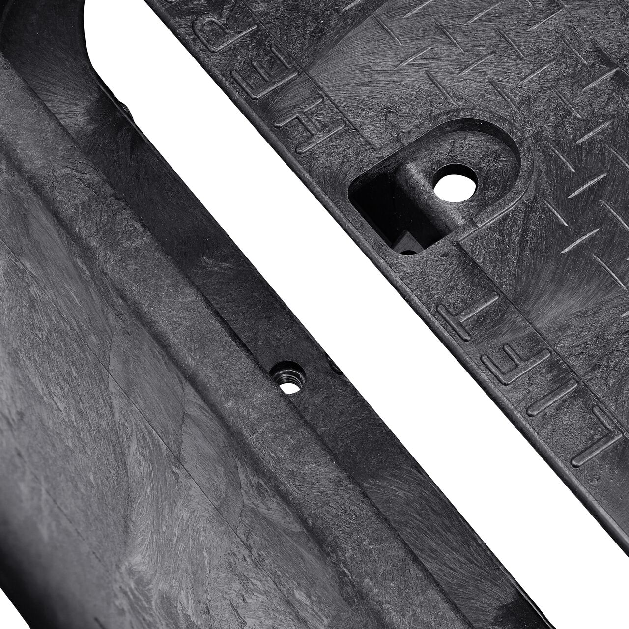 Align the bolt hole on the lid with the bolt hole from the NDS 13 in. X 20 in. Rectangular Standard Series Black Box and Black Water Cover (NDS 117BCW) for a secure fit